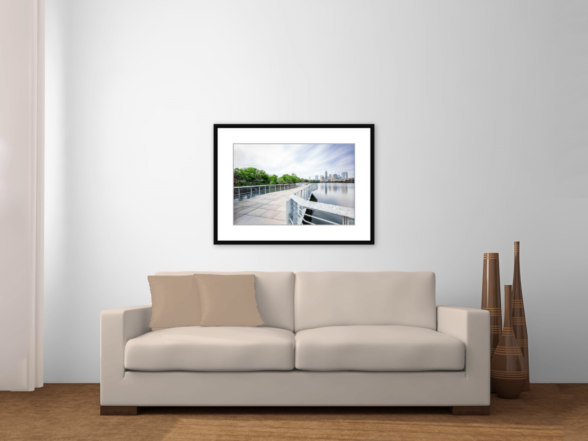 "Austin Skyline from Lady Bird Lake Boardwalk" Framed Print Above a Couch