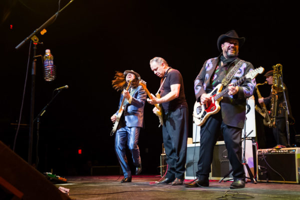 Eddie Perez, Jimmie Vaughan, and Raul Malo playing guitar at The Moody Theater